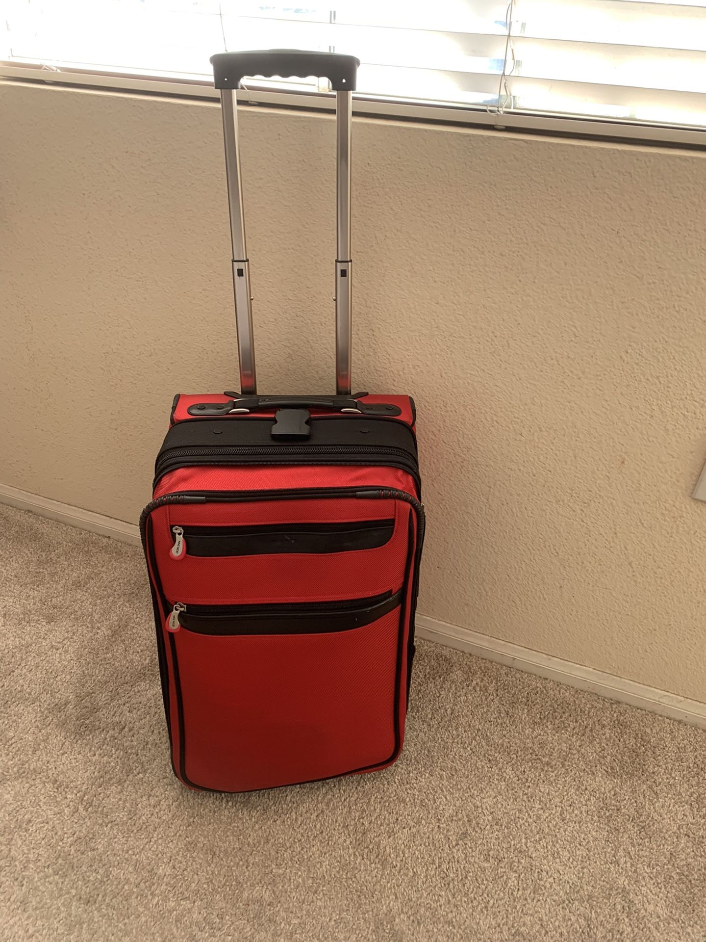 Nine west 21”x14” red carry on luggage