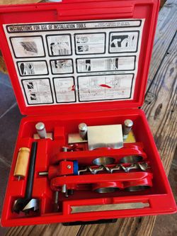 Quickset door lock installation tool.