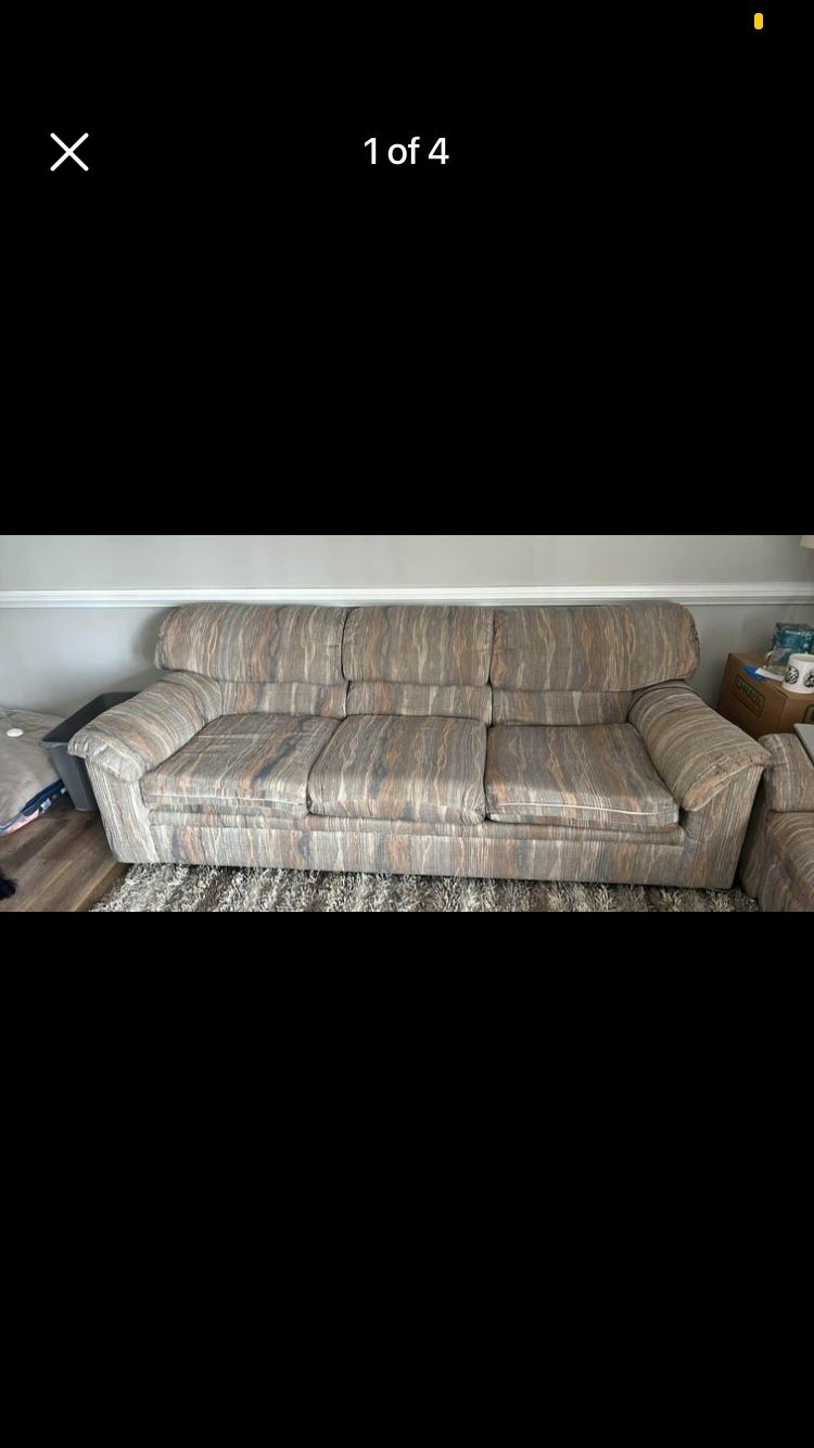 Couch And Reclining Love Seat