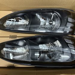 Headlights For 2004 To 2008 Pontiac Grand Prix; Black Housing With Clear Corners./ Luces Negras 