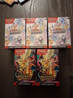 3 pokemon prismatic booster bundles along with 2 ascended heroes booster bundles