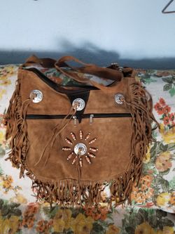 Very nice crossbody handbag.