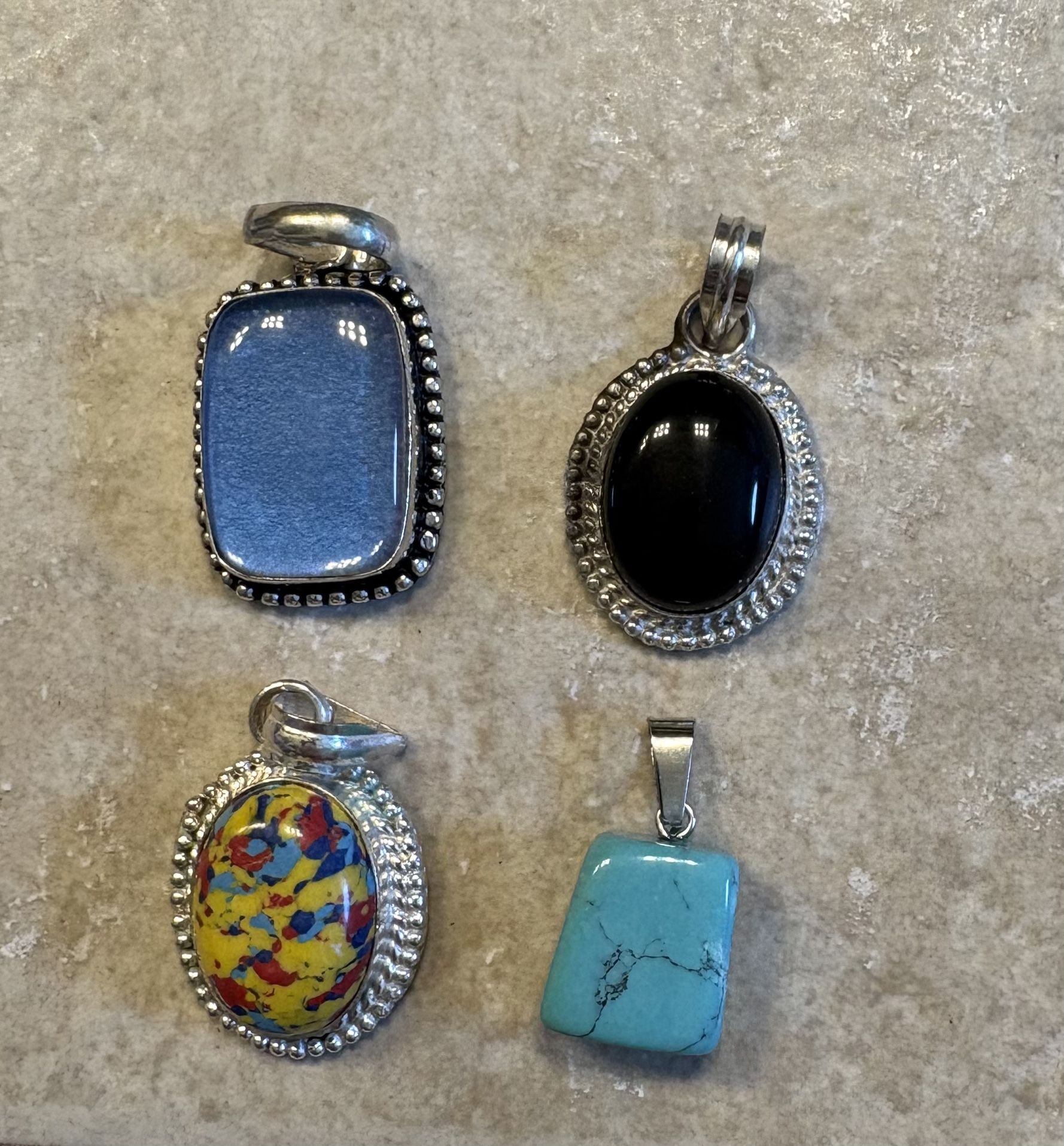 4 new sterling silver pendants
