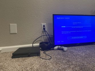 Ps4, white controller, Samsung tv and wireless headset