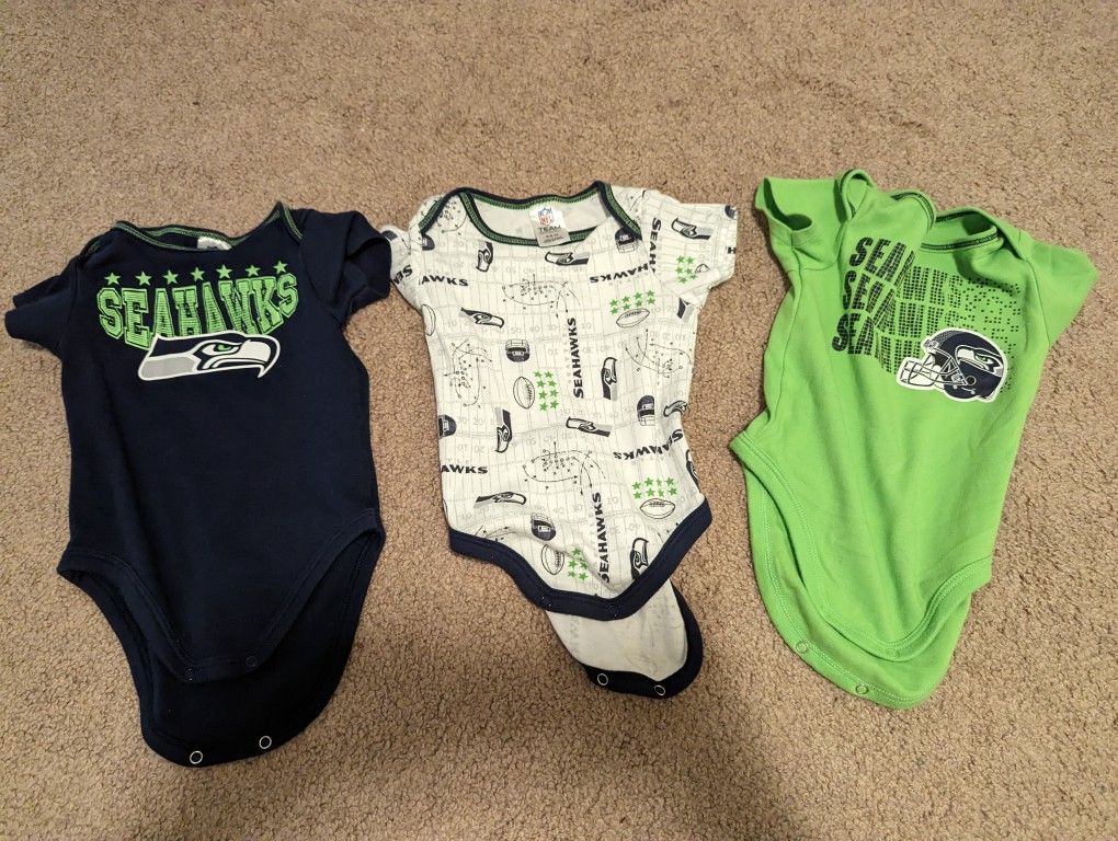 Infant Sized 3 -6 Month Official NFL Seahawks Onesies.