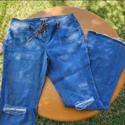 New York & Company distressed Flare Jeans with Lace-Up Front size 12