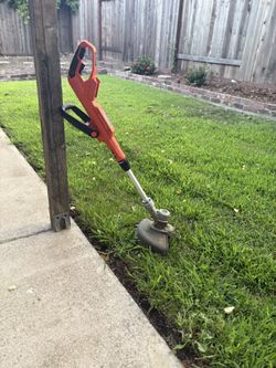 Weed Whacker with Extra String