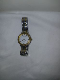Citizen Eco-Drive Silhouette Crystal two-tone women's watch featuring a diamond-accented bezel and a 27mm case