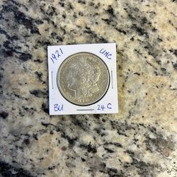 1921 MORGAN SILVER DOLLAR UNC. BU. (24c)