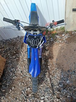 Blue Dirt Bike with Number Plate