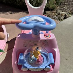 Disney pink ride on push car