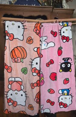 Hello kitty throw blanket x2 60 per blanket 100 for both