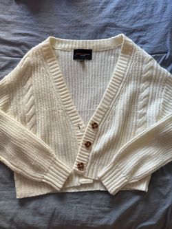 white Ambiance Apparel cable knit cardigan.