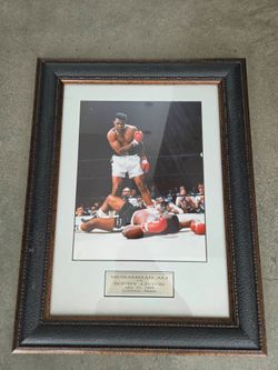 Framed Muhammad Ali vs. Sonny Liston Photo – Iconic Boxing Wall Art