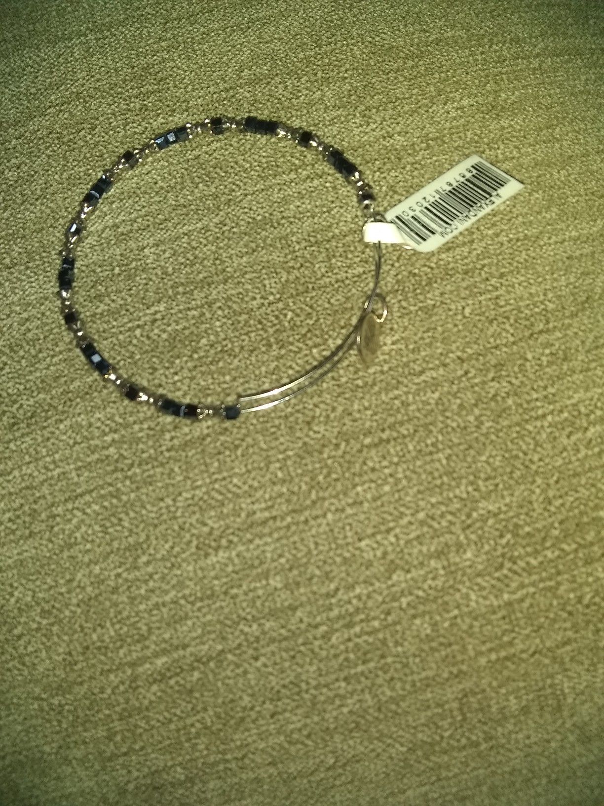 Silver and blue Alex and Ani bracelet