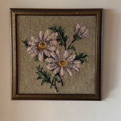 Woven ( crochet?) floral framed art.