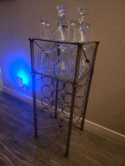 Industrial Designer Style Wine Rack Metal Holds 12 bottles of wine ,included with set of Glassware  never used them, all together