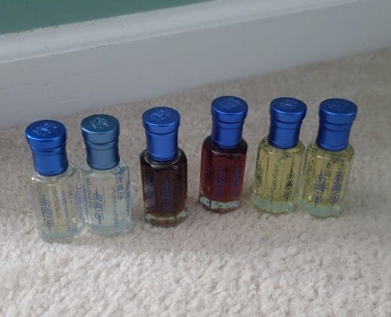 6 barely used abdul samad al qurashi perfume oils. ($30 each for 5) and (rose one is $100 )