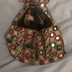Handcrafted bag with intricate embroidery and mirror details