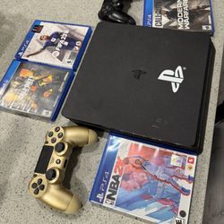 PS4 With 4 Games And Two Remotes