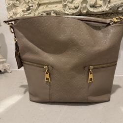 Louis Vuitton Empreinte Taupe Melie Purse