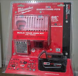 Milwaukee 5.0 Red Lithium M18 battery + charger kit. Firm price.