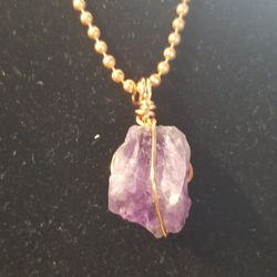 Amethyst pendant wrapped in copper wth copper necklace