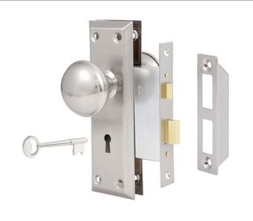 Skeleton key door knob assembly