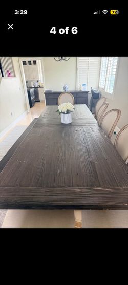 Living spaces dining table with bench.