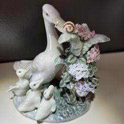 Lladro Mama Duck & Ducklings eyeing A Snail