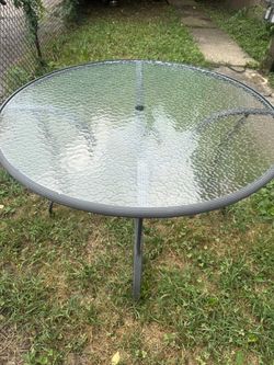 Outside Unique Round Glass Table with Umbrella **Price Negotiable**