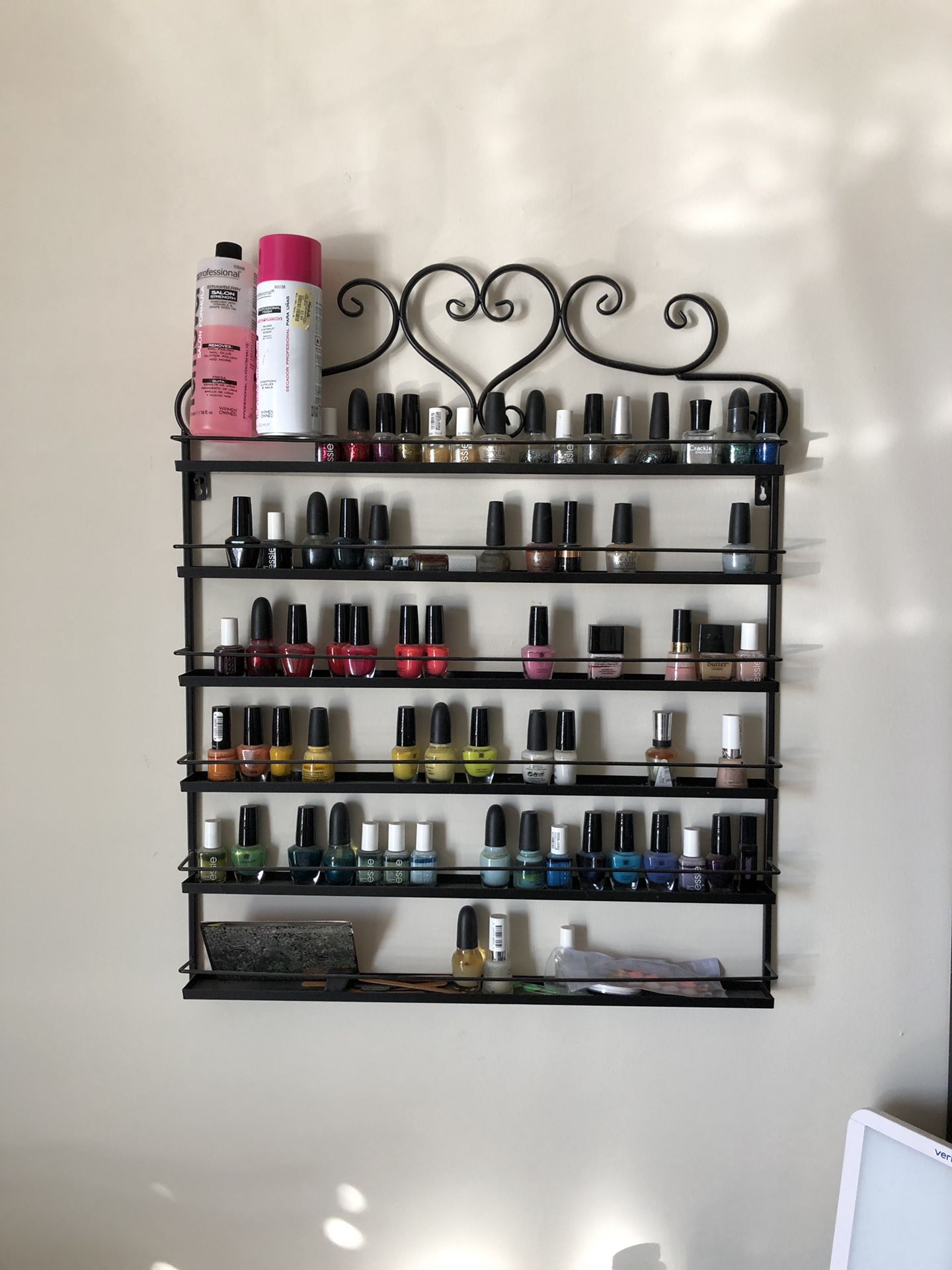 Wall mounted nail polish rack