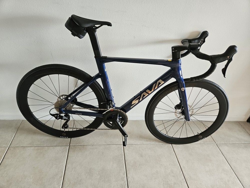 road bike new  $2500 carbon wheels Shimano pedals 105