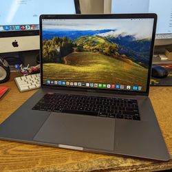 Apple MacBook Pro 15" 2019 Touchbar 6 Core i7 32gb 256gb Dual GPU

