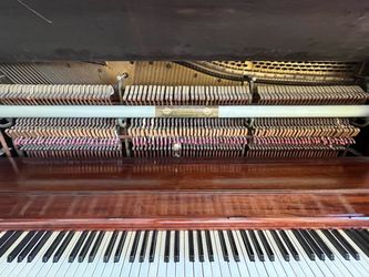 Beautiful working wooden piano for sale