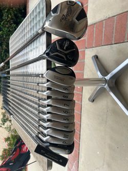 Titleist irons set (AP-1:new grip)and driver,wood and titleist golf bag included)