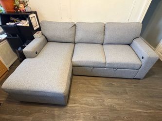 Grey Sectional w/ Pull Out Sleeper & USB/USB-C charger. Price Negotiable