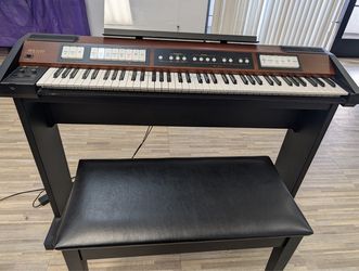Piano with chairs Roland electric with chairs
