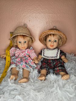 Small twin collectible dolls (brother & sister)