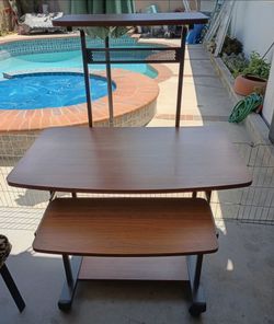 Desk with slide out keyboard Tray