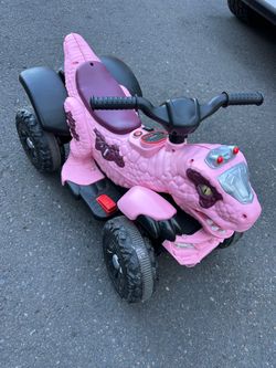Dinosaur power wheels