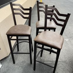 3 Brown Metal Bar Stools