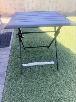Folding exterior/interior table