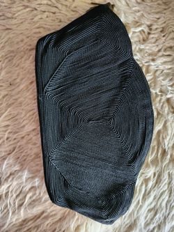 Vintage 1940's to 1950's black Cordé corded pattern fabric evening clutch purse demiloon featuring an Art Deco geometric pattern