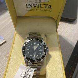 Men's Invicta Watch. Black Face, Water Resistant 200m. Model 5017