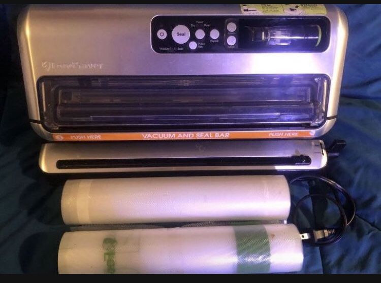 Foodsaver Vacuum Sealer Very Lightly Used Comes with 2 rolls of bags  save atleast 25$  Hardly used ,Everything works perfect. The FM5460 System