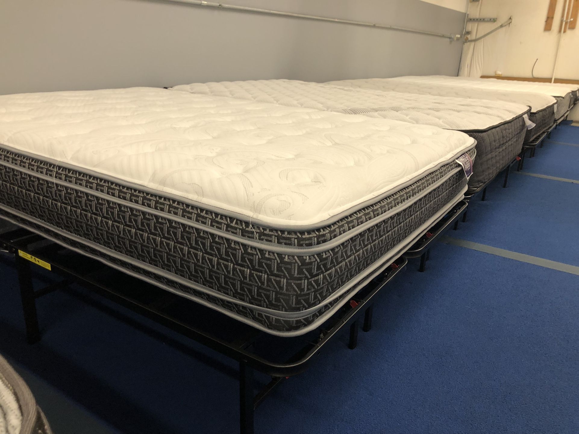 A bunch of pillowtop mattresses. Need to go NOW!