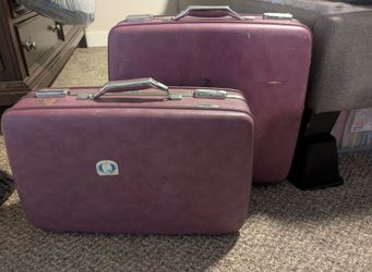 Vintage purple American Tourister hard-shell luggage set 1970s