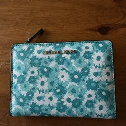 Michael Kors wallet with a floral pattern