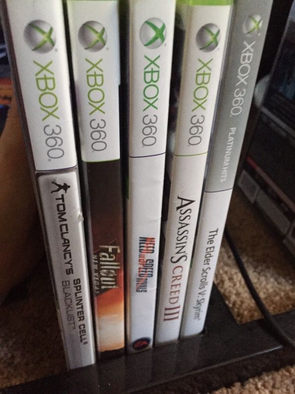 Xbox one games: elder scrolls skyrim, assassins creed 3, need for speed rivals, fallout new Vegas, tom clancy's splinter cell blacklist